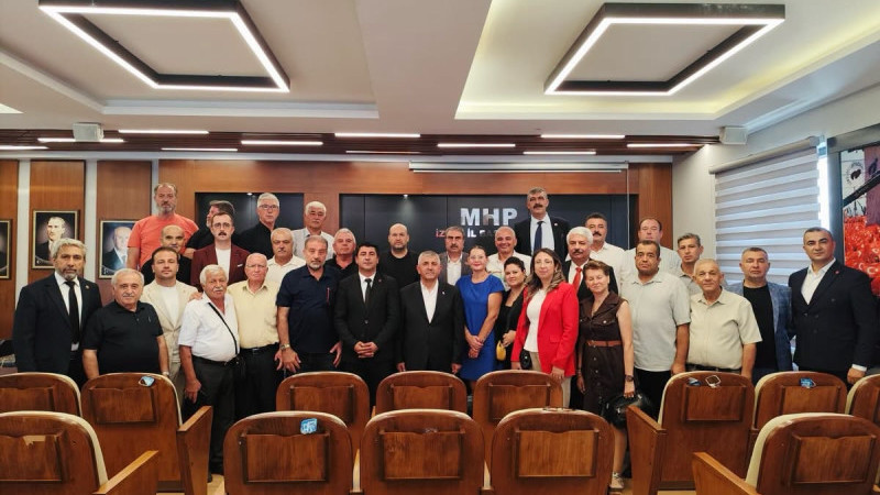 İzmir Muhtarlar Federasyonu'ndan MHP İzmir İl Başkanlığı'na ziyaret